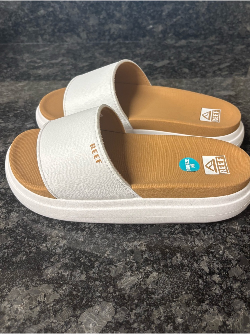 Reef White Slide Sandals with Tan Footbed Accent
